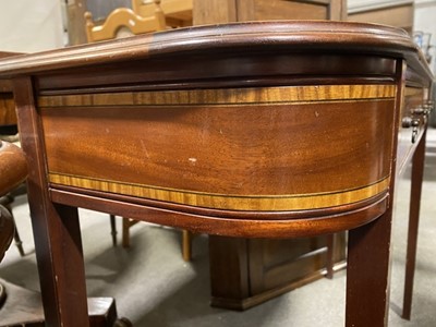 Lot 443 - A reproduction mahogany console table, in the Sheraton style