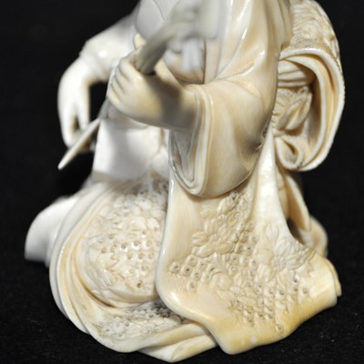 Lot 64 - A Japanese carved ivory okimono, Meiji