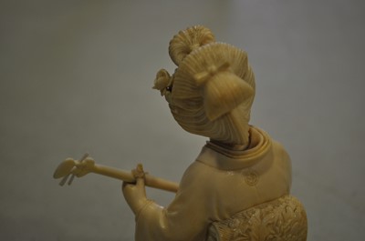 Lot 64 - A Japanese carved ivory okimono, Meiji