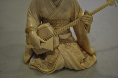 Lot 64 - A Japanese carved ivory okimono, Meiji