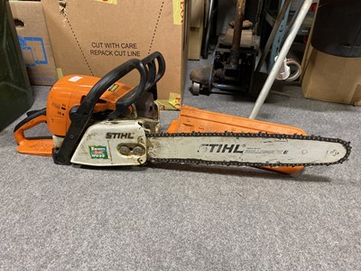 Lot 677 - Stihl MS290 chainsaw; Stihl 25 chainsaw; safety helmet; and boots.