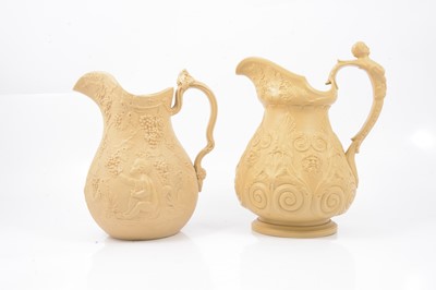 Lot 48 - Stoneware Putti jug and a Pan jug