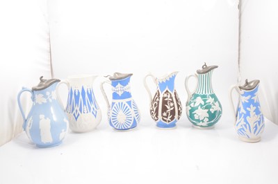 Lot 65 - Stoneware Arches & Scrolls jug and five other jugs