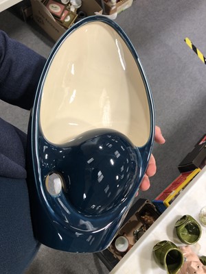 Lot 58 - Holkham Pottery blue and cream lamp base, green glazed two person tea set, Wade pig.
