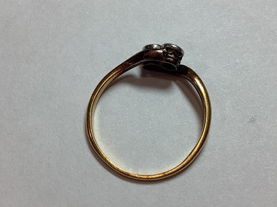 Lot 11 - A diamond two stone crossover ring