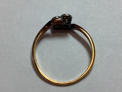 Lot 11 - A diamond two stone crossover ring