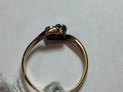 Lot 11 - A diamond two stone crossover ring