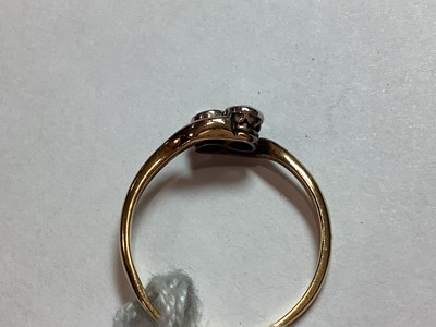Lot 11 - A diamond two stone crossover ring