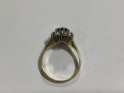 Lot 46 - A sapphire and diamond cluster ring
