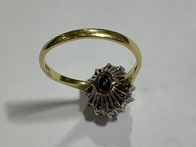 Lot 46 - A sapphire and diamond cluster ring