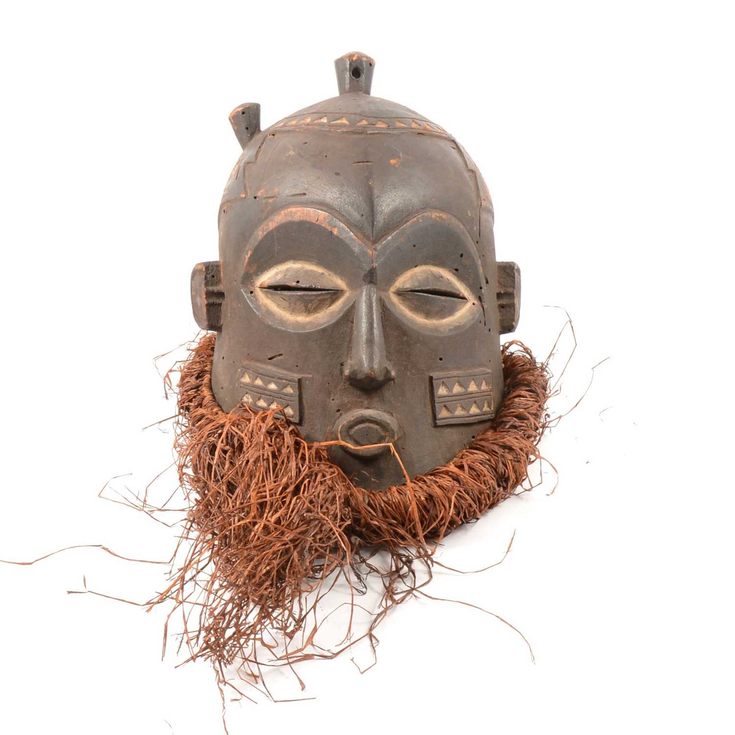 Lot 101 - Carved African tribal helmet mask, Bena Biombo, Democratic Republic of Congo
