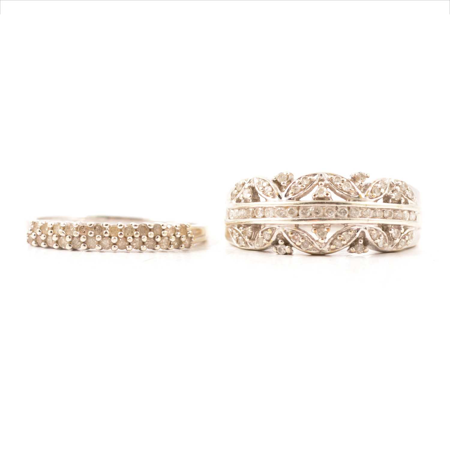 Lot 27 - A diamond half hoop ring and diamond eternity ring.