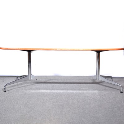 Lot 514 - Rosewood and chrome oval dining table, designed by Charles and Ray Eames for Herman Miller