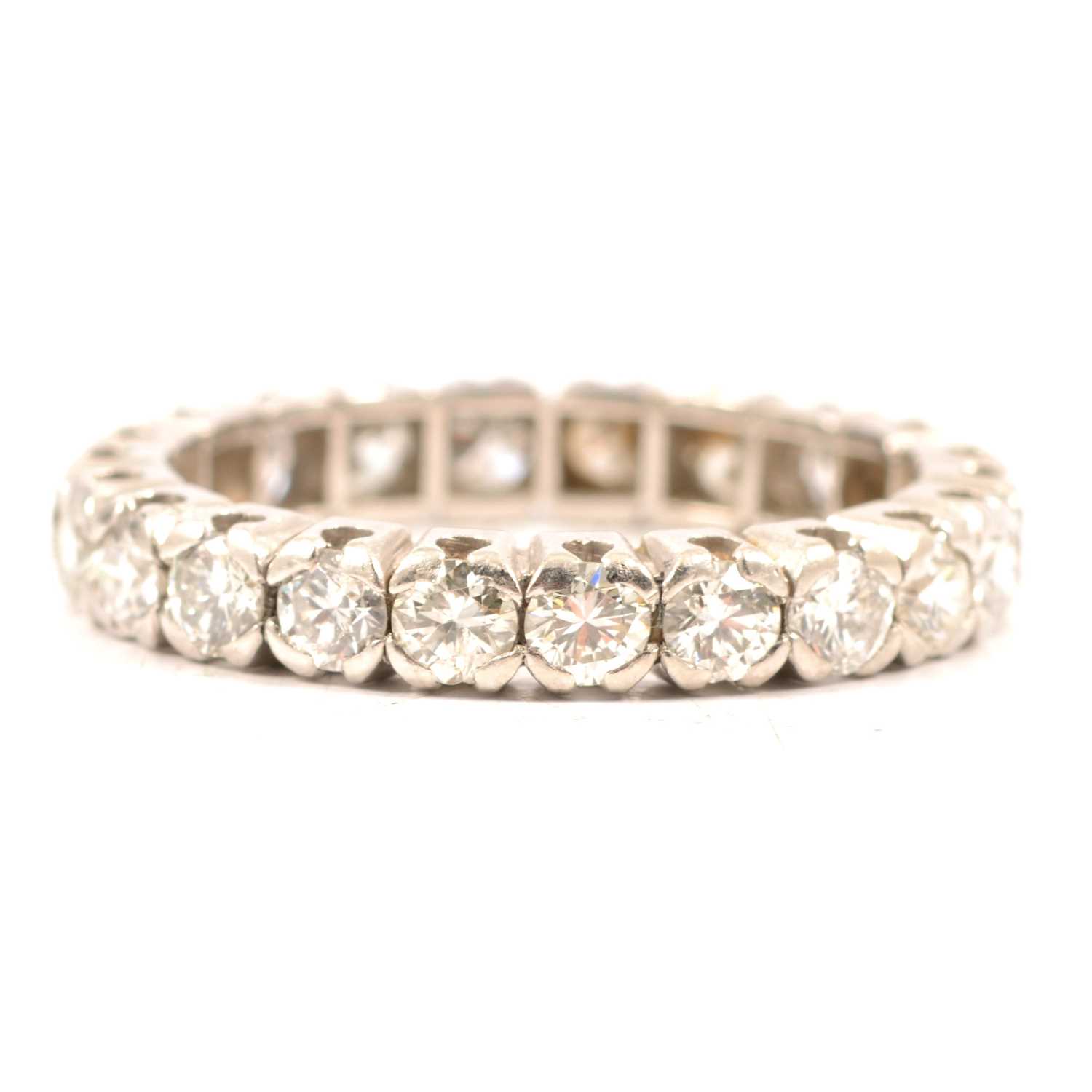 Lot 36 - A diamond full eternity ring.