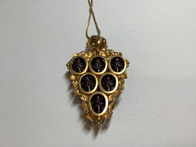 Lot 229 - A yellow metal scarab style pendant on a foxtail link chain.