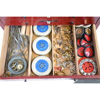 Lot 1047 - Meccano wooden dealers cabinet, six drawers and parts.