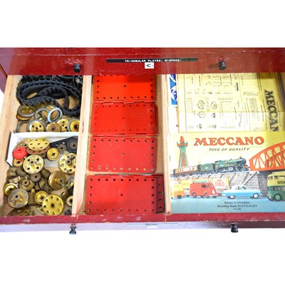 Lot 1047 - Meccano wooden dealers cabinet, six drawers and parts.