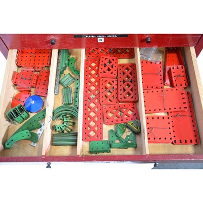 Lot 1047 - Meccano wooden dealers cabinet, six drawers and parts.