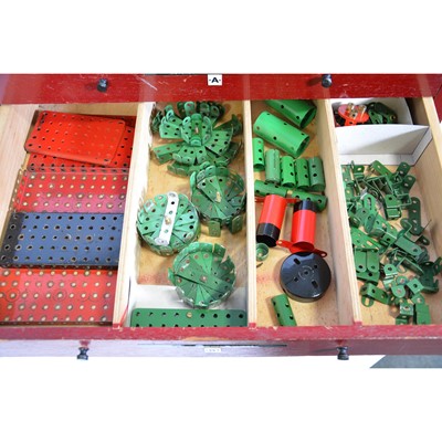 Lot 1047 - Meccano wooden dealers cabinet, six drawers and parts.