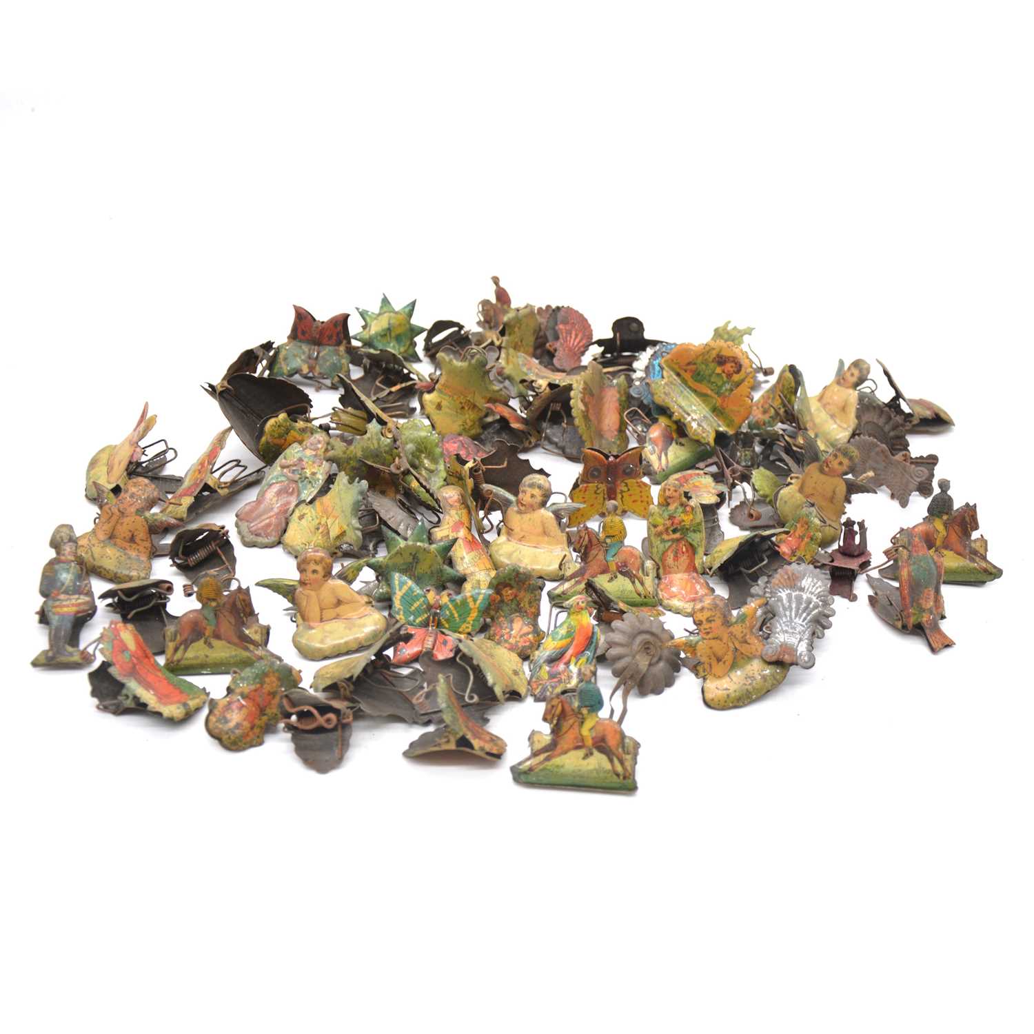 Lot 1024 - Victorian candle clips, approximately 76, tin-plate, including horse racers; cherubs etc