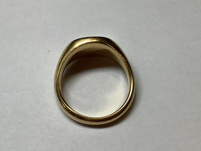Lot 99 - An 18 carat yellow gold signet ring.
