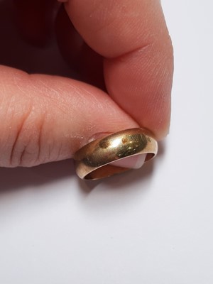 Lot 117 - A 9 carat rose gold wedding band, and six gemset rings.