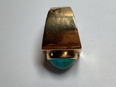 Lot 94 - A large turquoise dress ring.