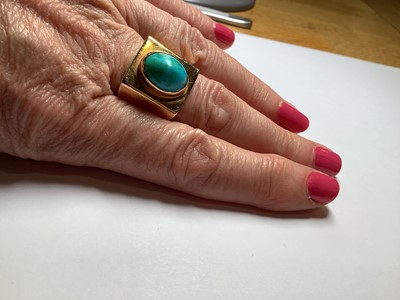 Lot 94 - A large turquoise dress ring.