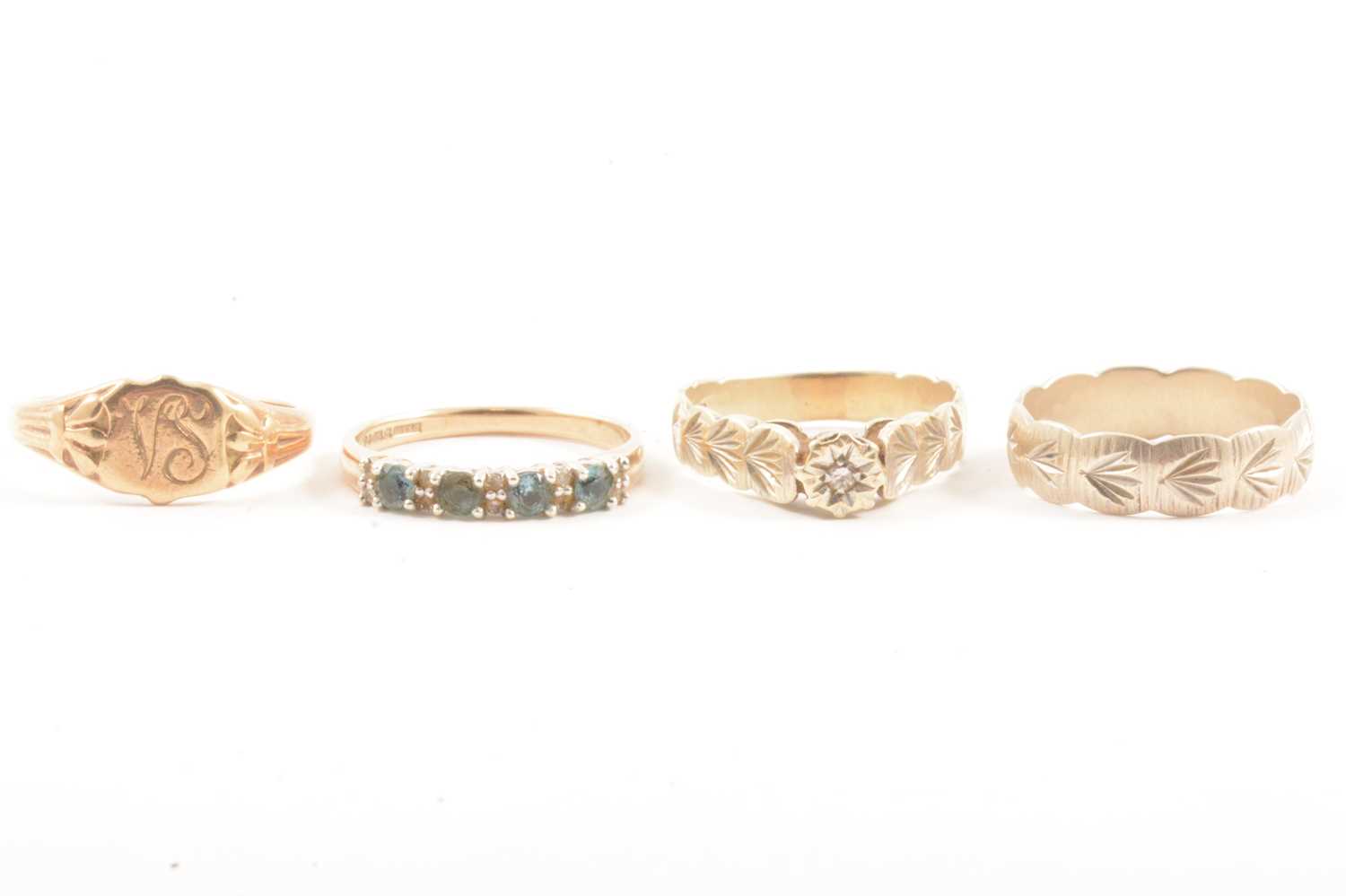 Lot 115 - Four 9 carat yellow gold rings.
