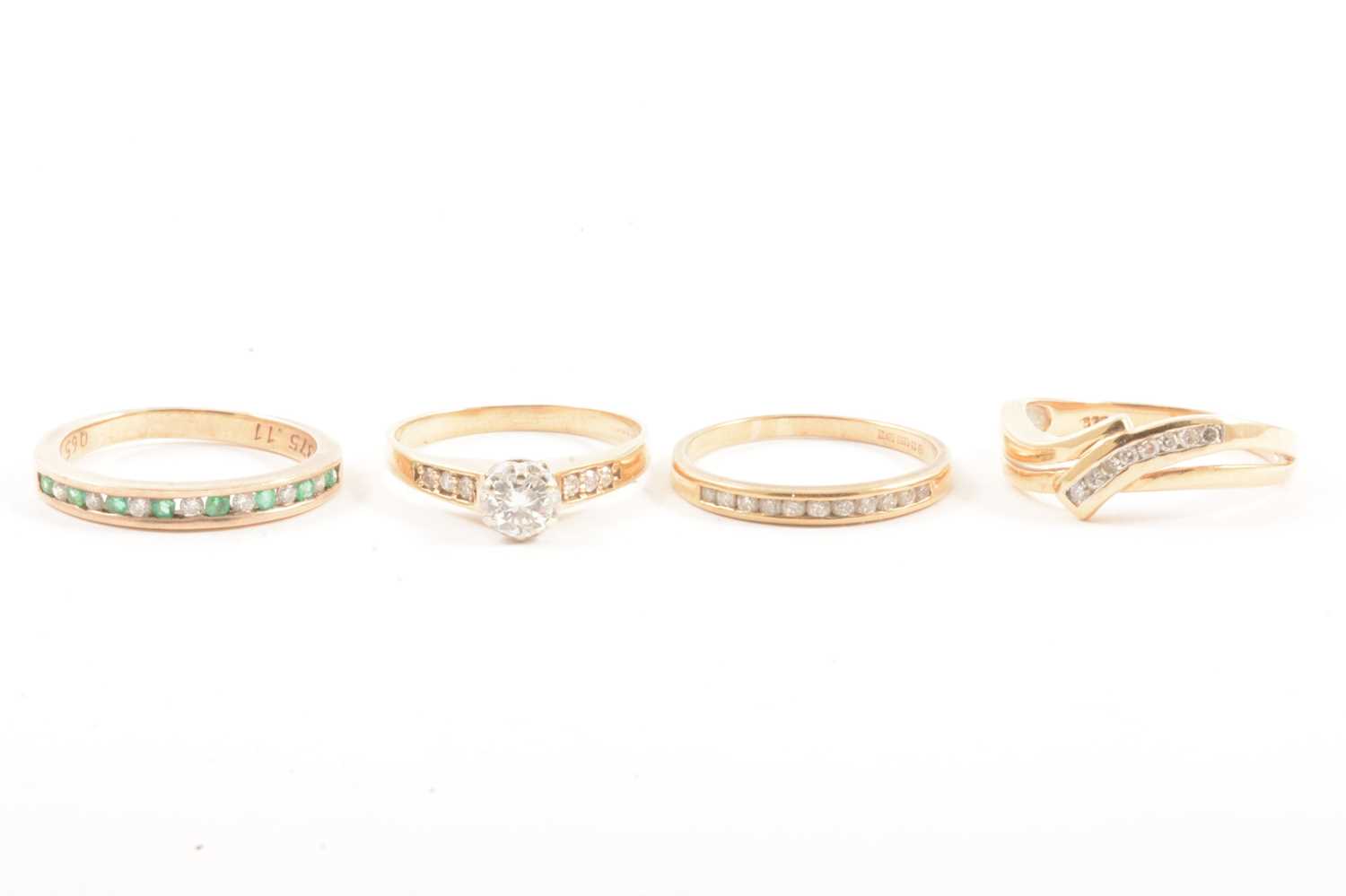 Lot 109 - Four 9 carat gold diamond rings
