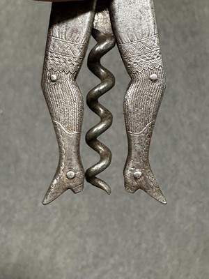 Lot 65 - Novelty folding corkscrew in the form of a pair of ladies legs