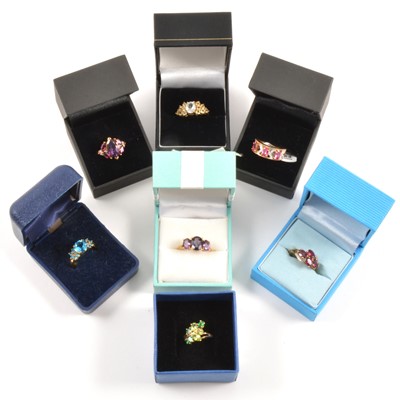 Lot 122 - Twenty modern gemset 9 carat gold rings.