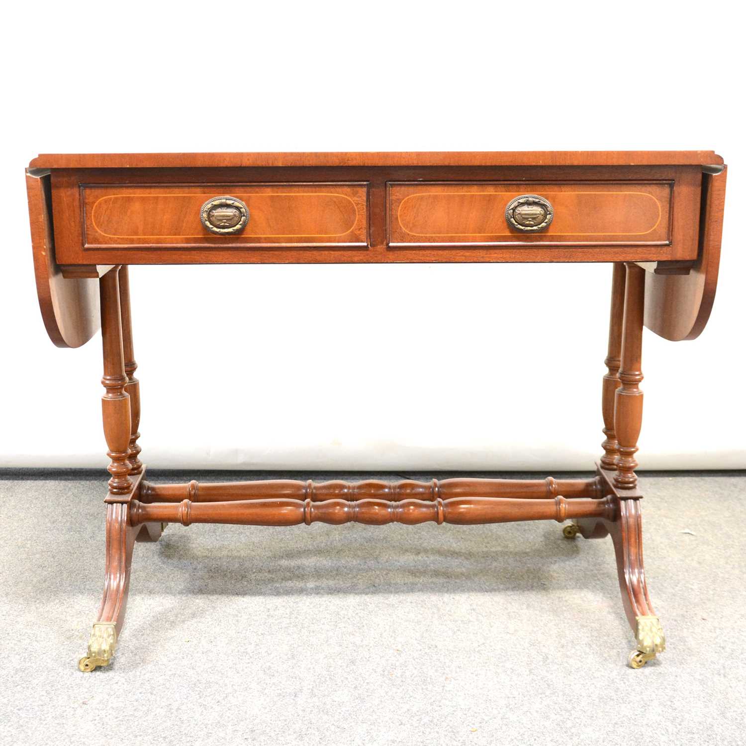 Lot 475 - Reproduction mahogany sofa table