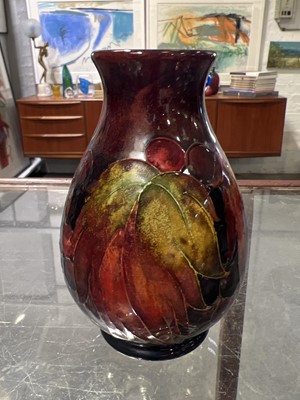 Lot 523 - Moorcroft Pottery, a flambe 'Leaf and Berry' design vase