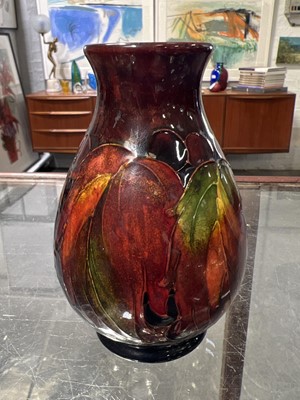 Lot 523 - Moorcroft Pottery, a flambe 'Leaf and Berry' design vase