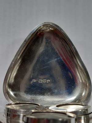 Lot 310 - Victorian silver triangular triple Sovereign coin case