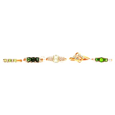 Lot 23 - Five chrome diopside and other green gemstone and diamond rings.