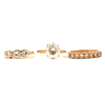 Lot 85 - Three gemset rings, diamond and cubic zirconia.