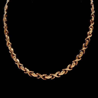 Lot 154 - A 9 carat yellow gold cross and heart design necklace.
