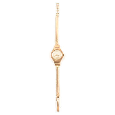 Lot 382 - A lady's 9 carat yellow gold bracelet wristwatch.