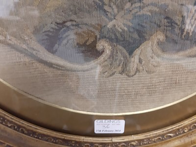 Lot 36 - Early 19th century needlework panel in a gilt frame, mirror, and a brass and onyx candelabra