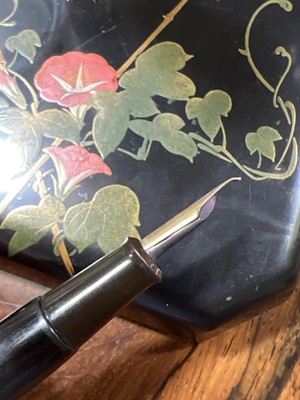 Lot 62 - Dunhill Namiki fountain pen on square form desk stand, with paperwork