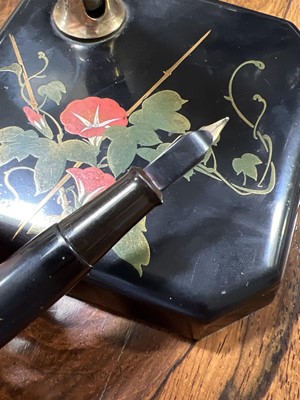 Lot 62 - Dunhill Namiki fountain pen on square form desk stand, with paperwork
