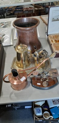 Lot 235 - Copper jardiniere, copper and brass watering can, scales, blow torch and other brasswares.