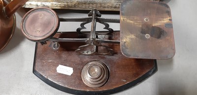 Lot 235 - Copper jardiniere, copper and brass watering can, scales, blow torch and other brasswares.