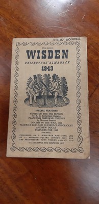 Lot 214 - Wisden Cricketers' Almanack 1943, and other cricket-related booklets.