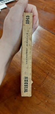 Lot 214 - Wisden Cricketers' Almanack 1943, and other cricket-related booklets.