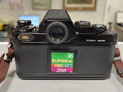 Lot 243 - Nikon F3 camera, various lenses, filters and accessories.