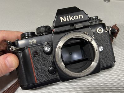 Lot 243 - Nikon F3 camera, various lenses, filters and accessories.