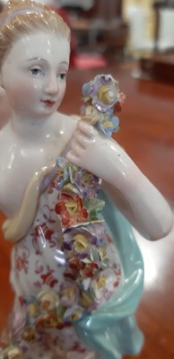 Lot 149 - Three Meissen figures, Grape Picker Boy, two allegorical figures of The Seasons.